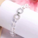 Load image into Gallery viewer, Clear Quartz Faceted Beads Infinity Charm Bracelet