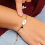 Load image into Gallery viewer, Evil Eye Pearl Charm Golden Chain Bracelet