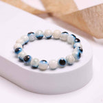 Load image into Gallery viewer, Natural Evil Eye Aragonite Bracelet
