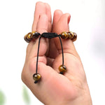 Load image into Gallery viewer, Tiger Eye Thread Bracelet 8mm
