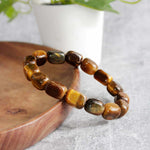 Load image into Gallery viewer, Tiger Eye Tumble Bracelet
