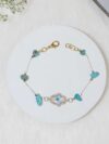 Shop Firoza (Turquoise) Chips Hamsa Hand Charm Chain Bracelet